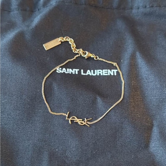 Yves Saint Laurent Jewelry - AUTHENTIC YSL CASSANDRE CHARM BRACELET IN METAL - Rose Gold Plated